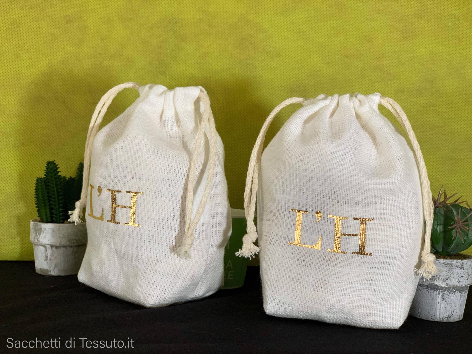 Sacchetto di tessuto in lino puro bianco con stampe oro