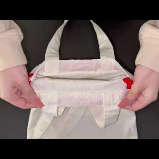 Sacchetto in cotone con chiusura coulisse e manici
