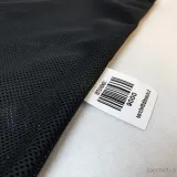 Détail du sac en filet pour la collecte de pièces de monnaie
