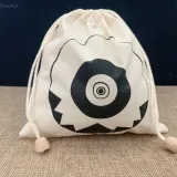 Sac en coton avec nœuds en bois