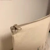 détail zip éclair pochette en coton naturel