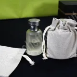Sacchetto en coton gris chiné avec fermeture en bonbon, pour petits objets de mode, cosmétiques et produits bio véganes