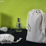 Gray melange cotton pouch with standard 2-string drawstring closure for cosmetics, luxury fashion accessories