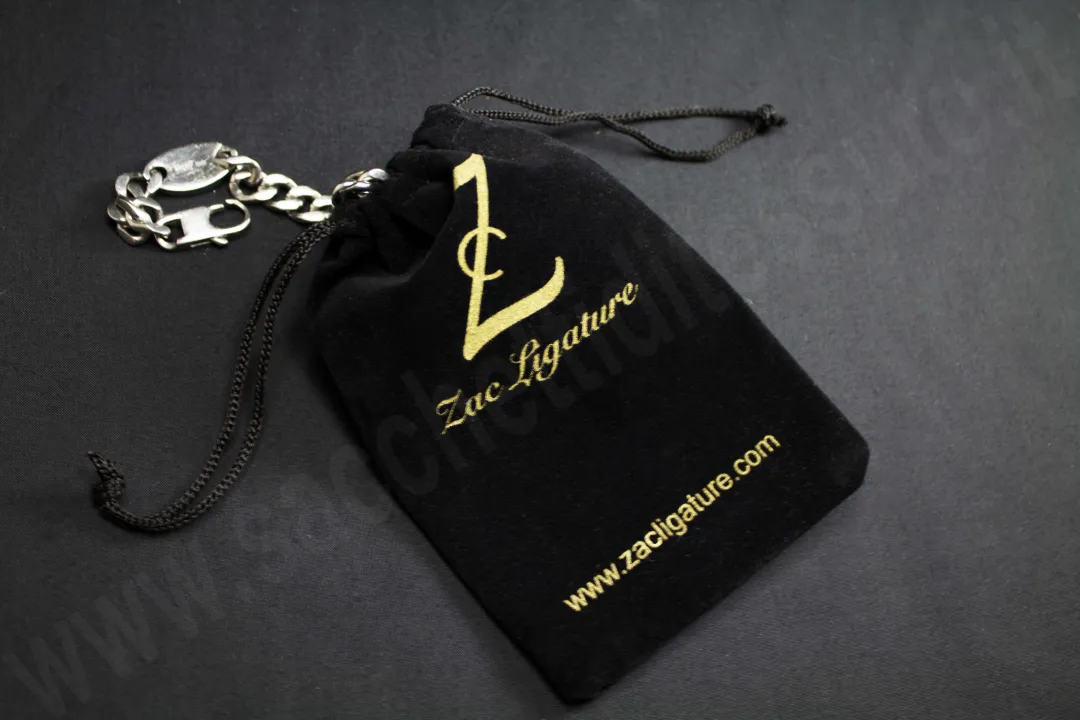 Sac en velours simil Alcantara noir imprimé en or pour bijoux et fantaisie
