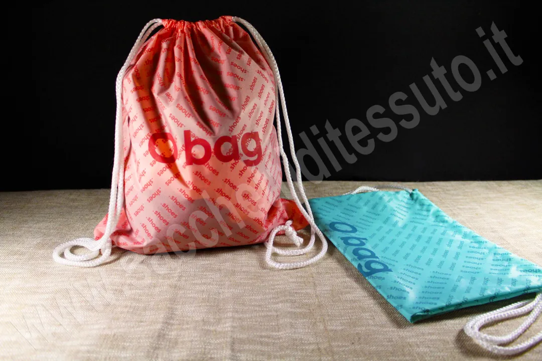 Nylon shoulder bag for footwear and leather goods with continuous print
