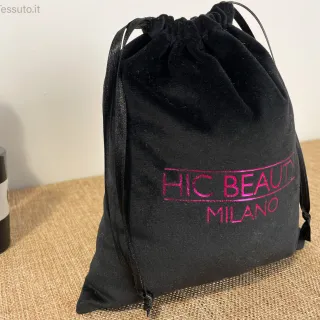 Sacchetto in velluto morbido nero con nastrini in raso